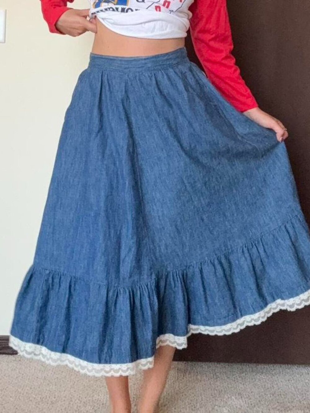 Vintage denim midi skirt with white lace trim bottom detail and pockets